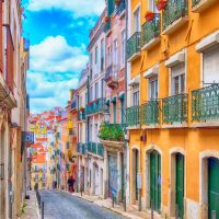 Lisbon, Portugal street perspective view with colorful traditional houses